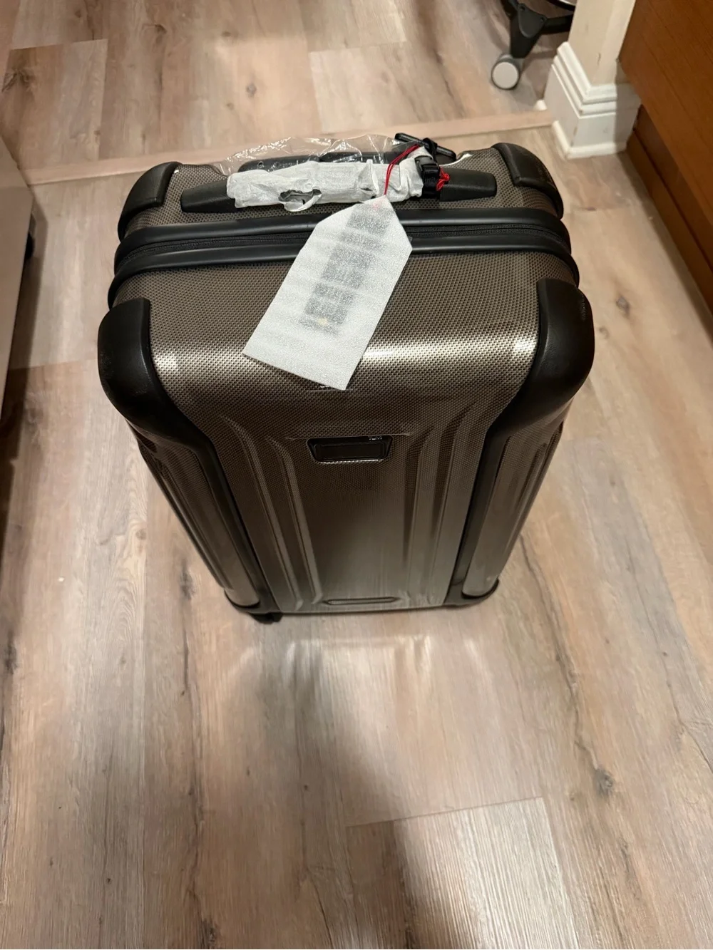TUMI Vapor International Carry-On 22” Spinner Fossil 98408